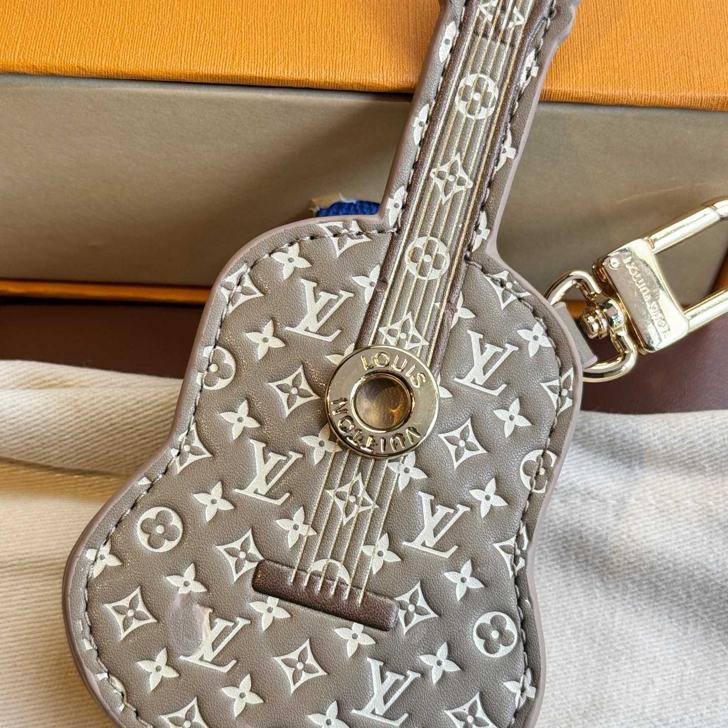 Louis Vuitton Guitar Pouch Bag Charm   M02032 - DopestKickz