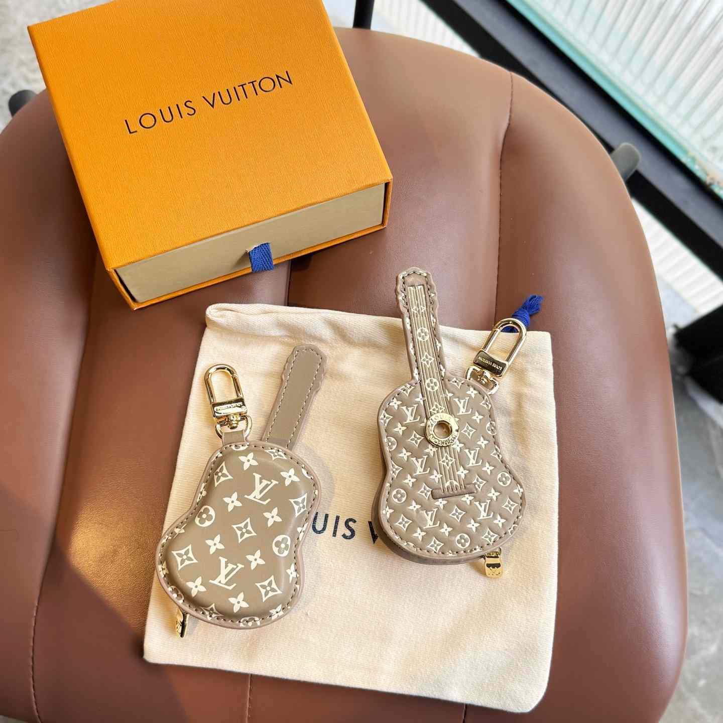 Louis Vuitton Guitar Pouch Bag Charm   M02032 - DopestKickz