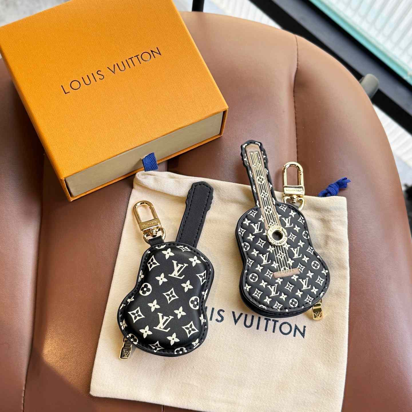 Louis Vuitton Guitar Pouch Bag Charm   M02032 - DopestKickz