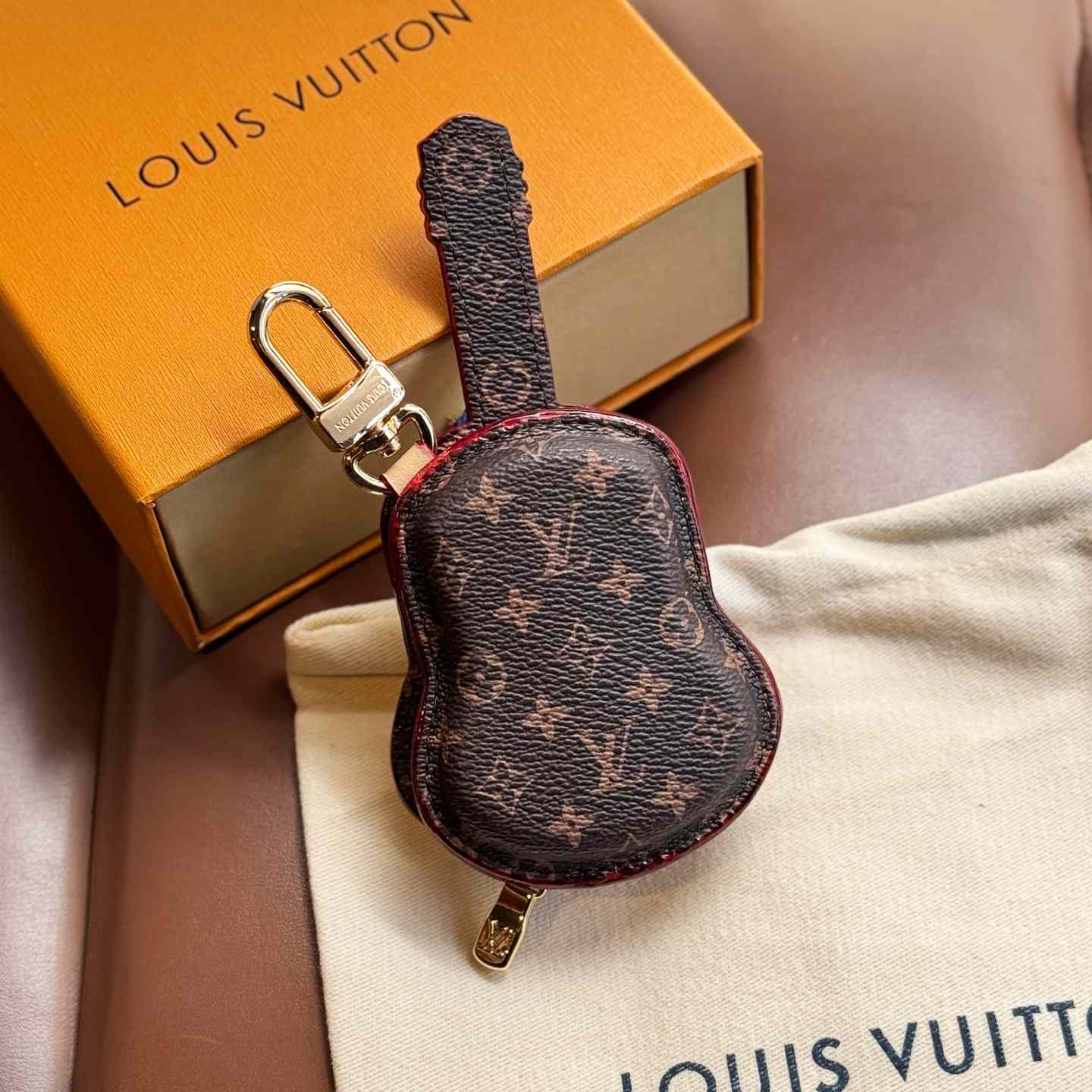 Louis Vuitton Guitar Pouch Bag Charm   M02032 - DopestKickz
