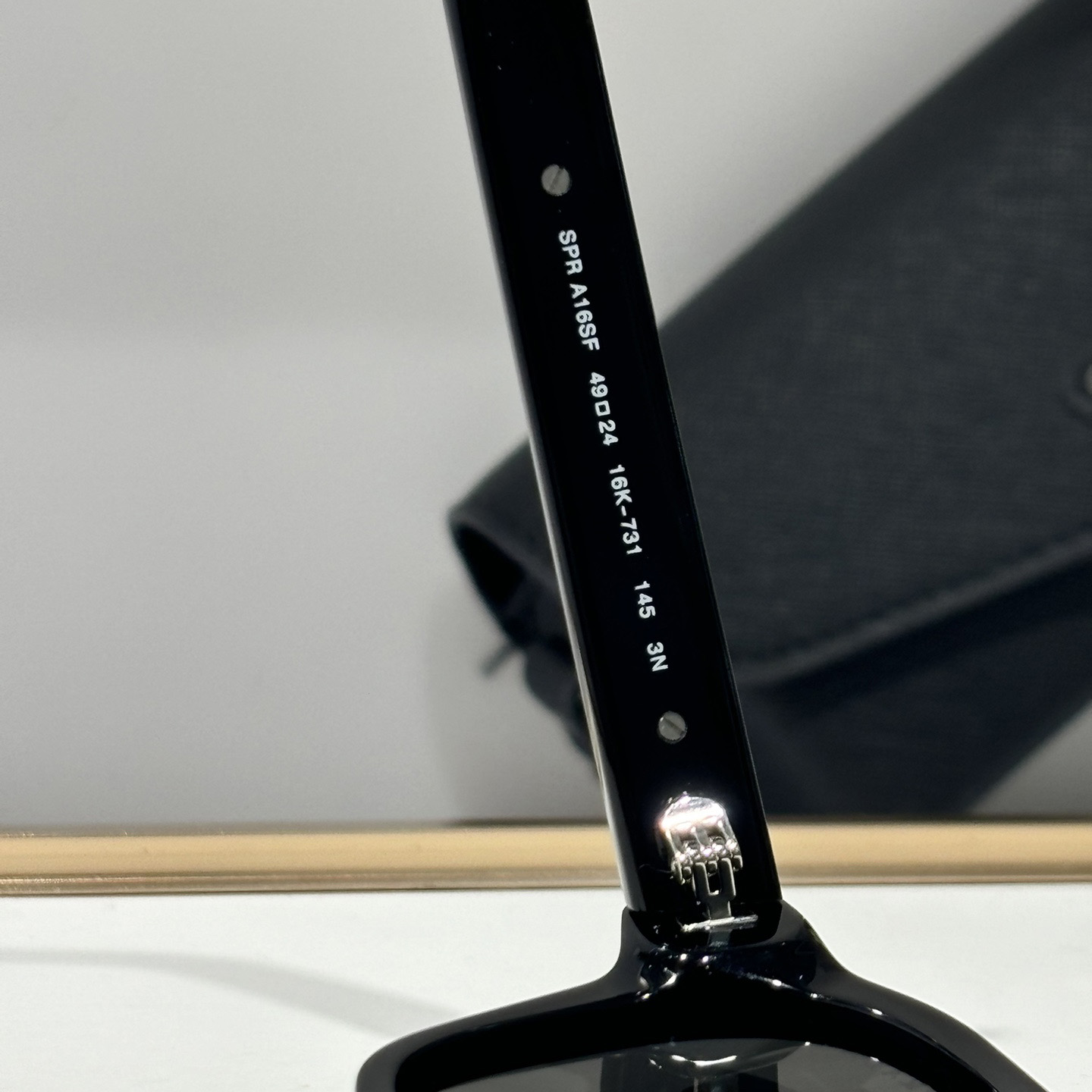 Prada Sunglasses With Iconic Metal Plaque   SPR A16SF - DopestKickz