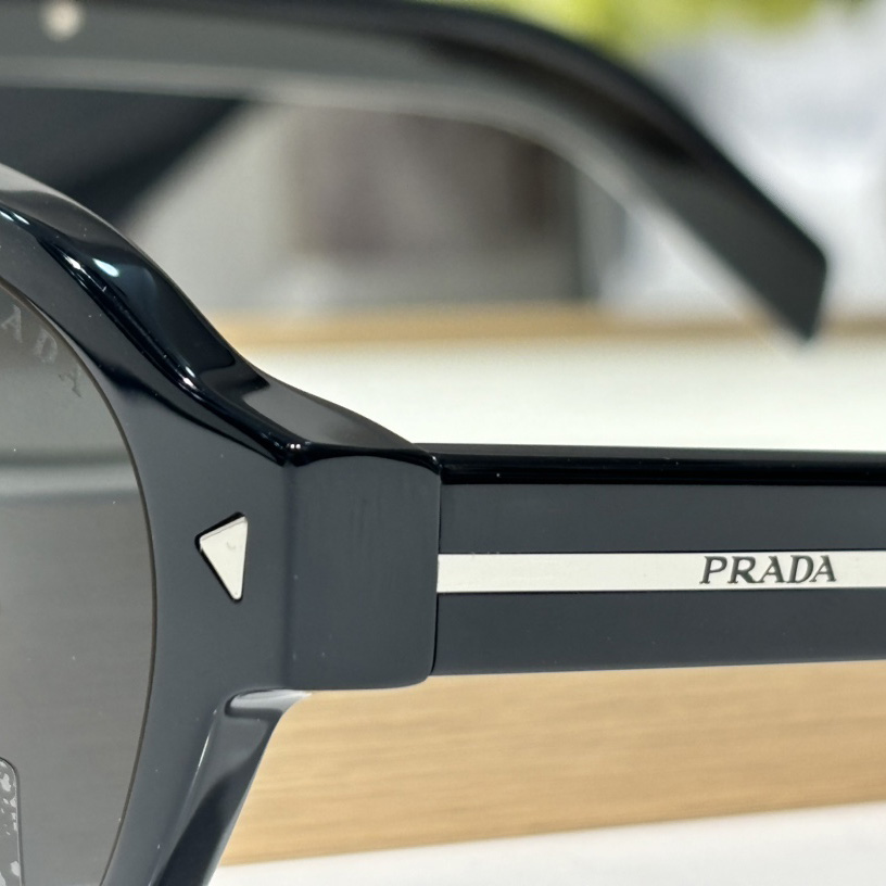 Prada Sunglasses With Iconic Metal Plaque   SPR A16SF - DopestKickz