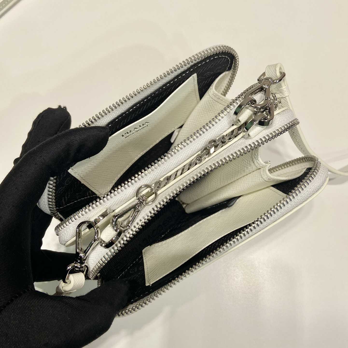 Prada Triangular Embellished Satin And Leather Mini-pouch - DopestKickz