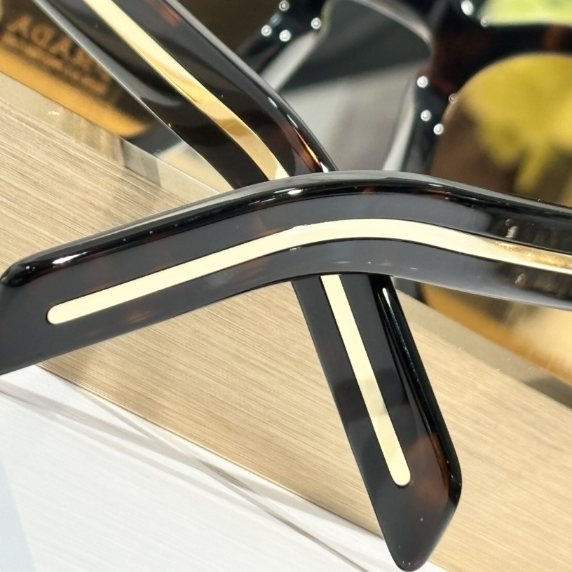 Prada Sunglasses With Iconic Metal Plaque   SPR A16SF - DopestKickz