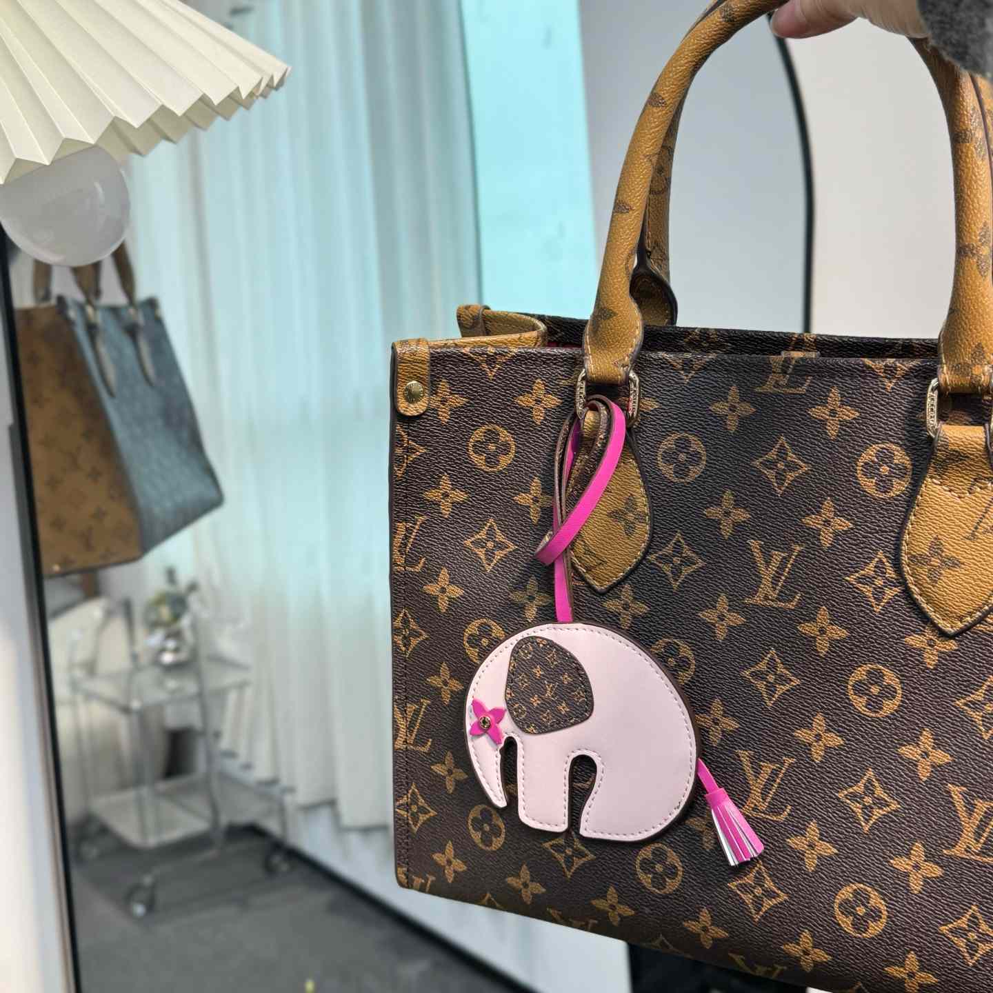 Louis Vuitton LV Elephant Bag Charm   M02383 - DopestKickz