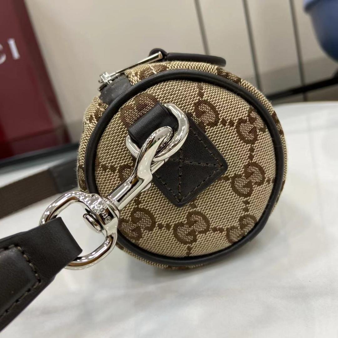 Gucci GG Canvas Mini Cylinder Bag - DopestKickz