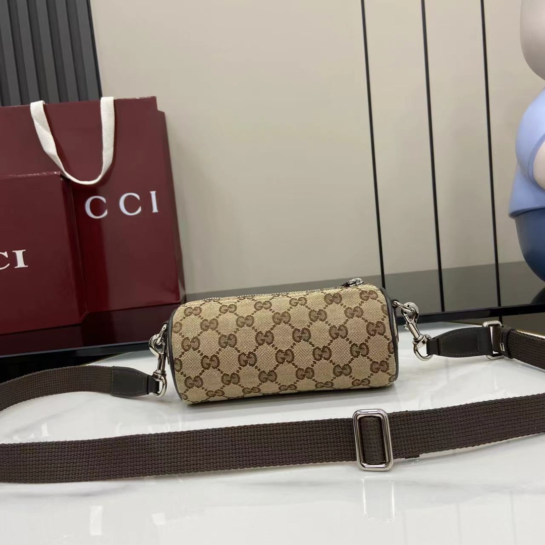 Gucci GG Canvas Mini Cylinder Bag - DopestKickz