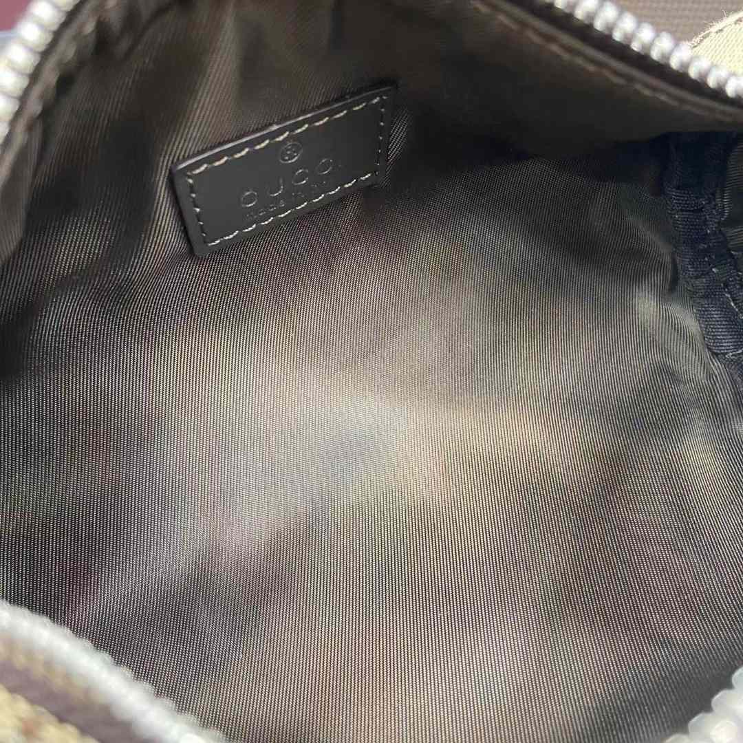 Gucci GG Canvas Mini Cylinder Bag - DopestKickz