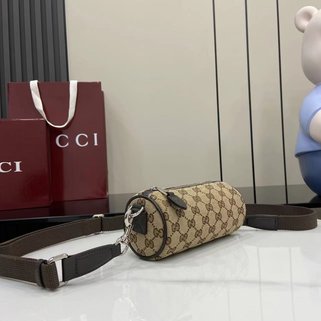 Gucci GG Canvas Mini Cylinder Bag - DopestKickz