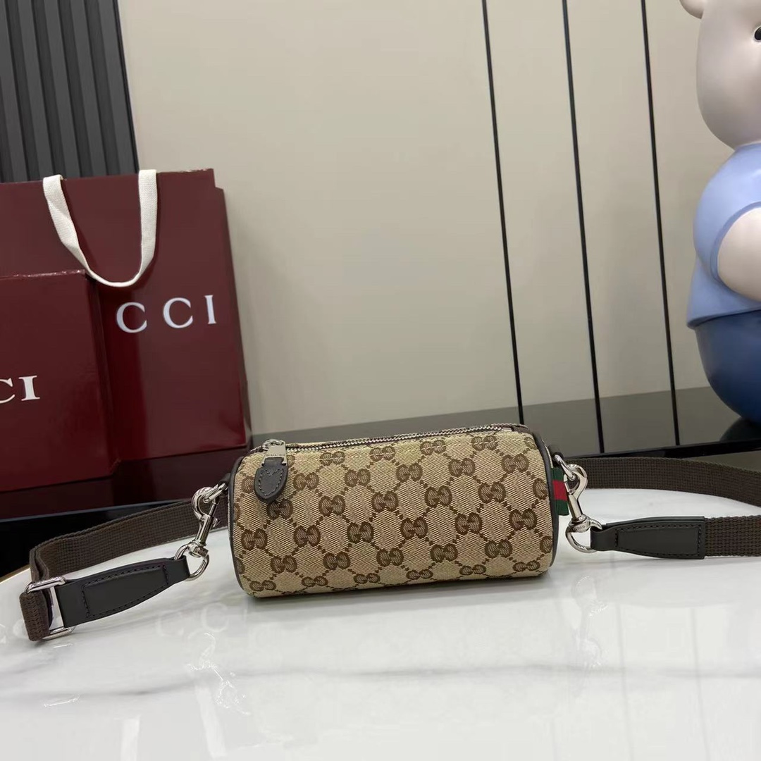 Gucci GG Canvas Mini Cylinder Bag - DopestKickz
