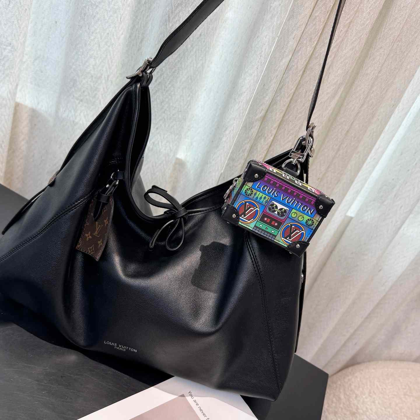 Louis Vuitton LV Stereo Bag Charm   M02395 - DopestKickz