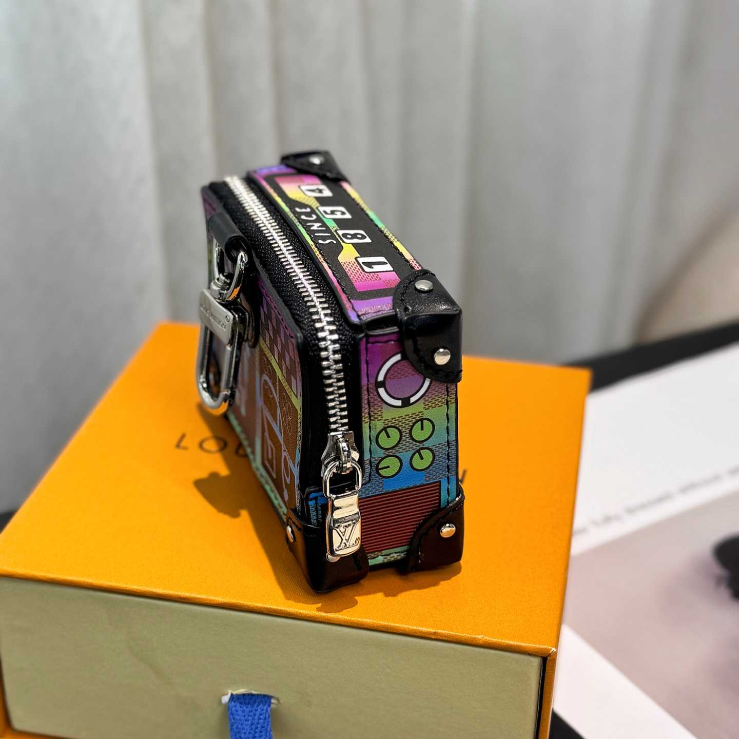 Louis Vuitton LV Stereo Bag Charm   M02395 - DopestKickz