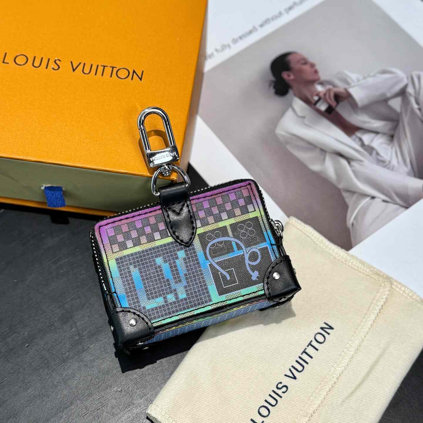 Louis Vuitton LV Stereo Bag Charm   M02395 - DopestKickz