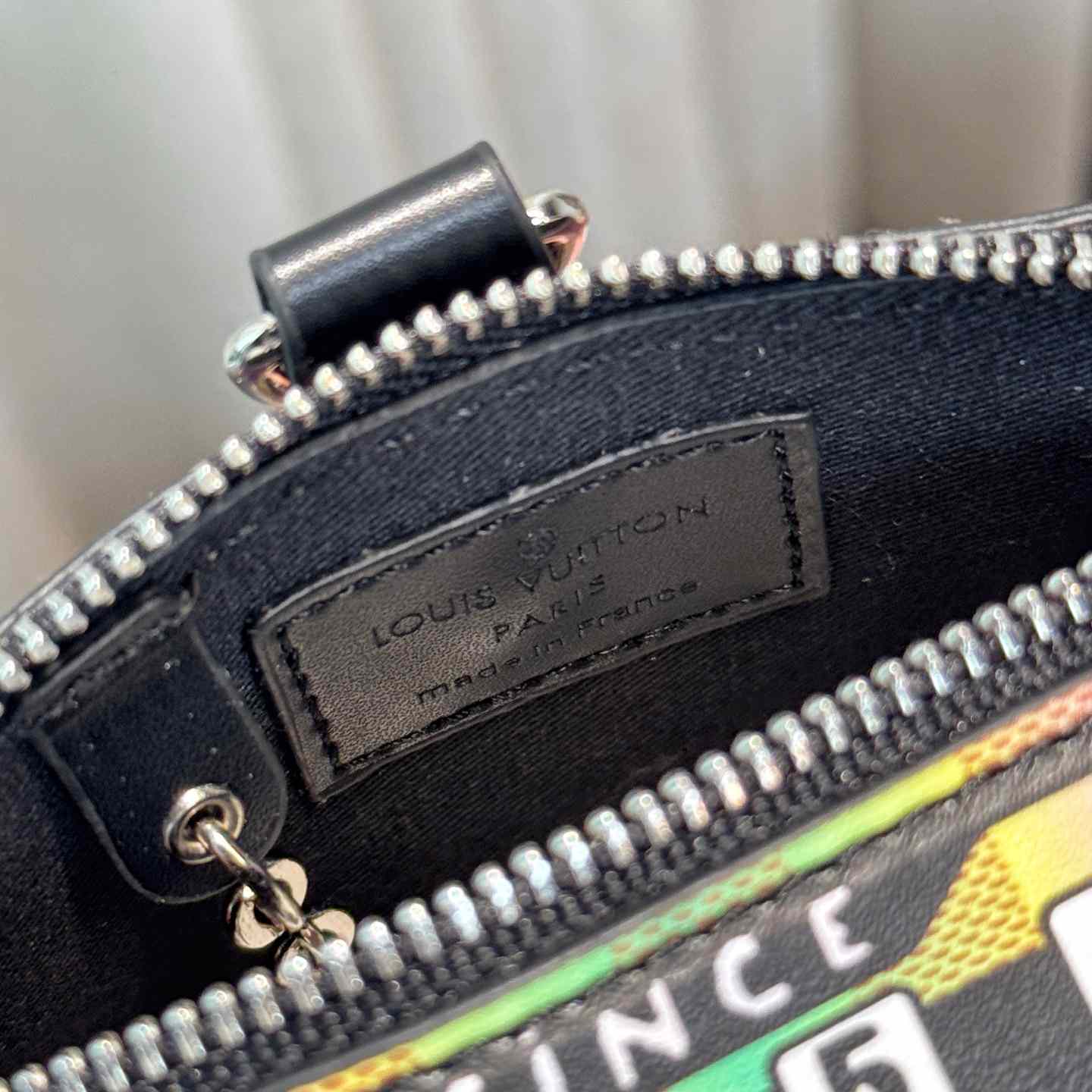 Louis Vuitton LV Stereo Bag Charm   M02395 - DopestKickz