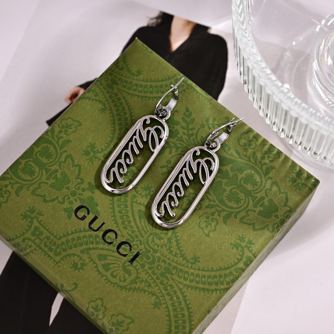 Gucci Script Logo Drop Earrings - DopestKickz