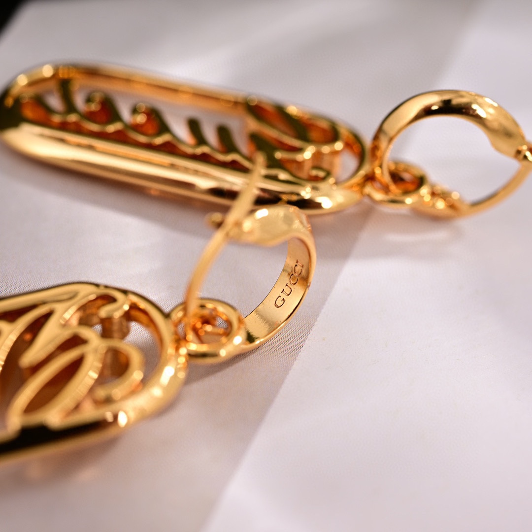 Gucci Script Logo Drop Earrings - DopestKickz