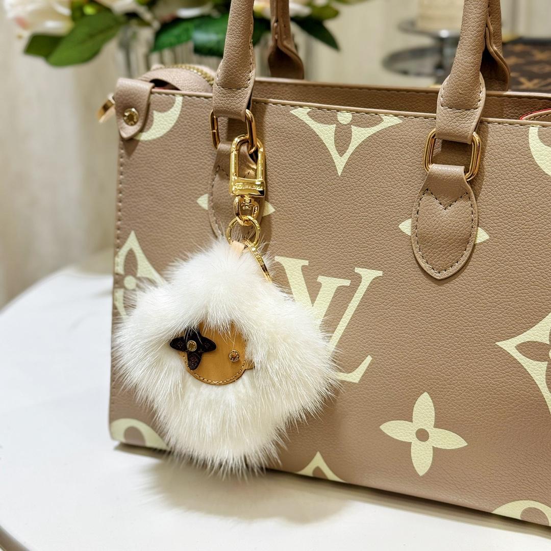 Louis Vuitton Vivienne Fur Key Holder   M02300 - DopestKickz