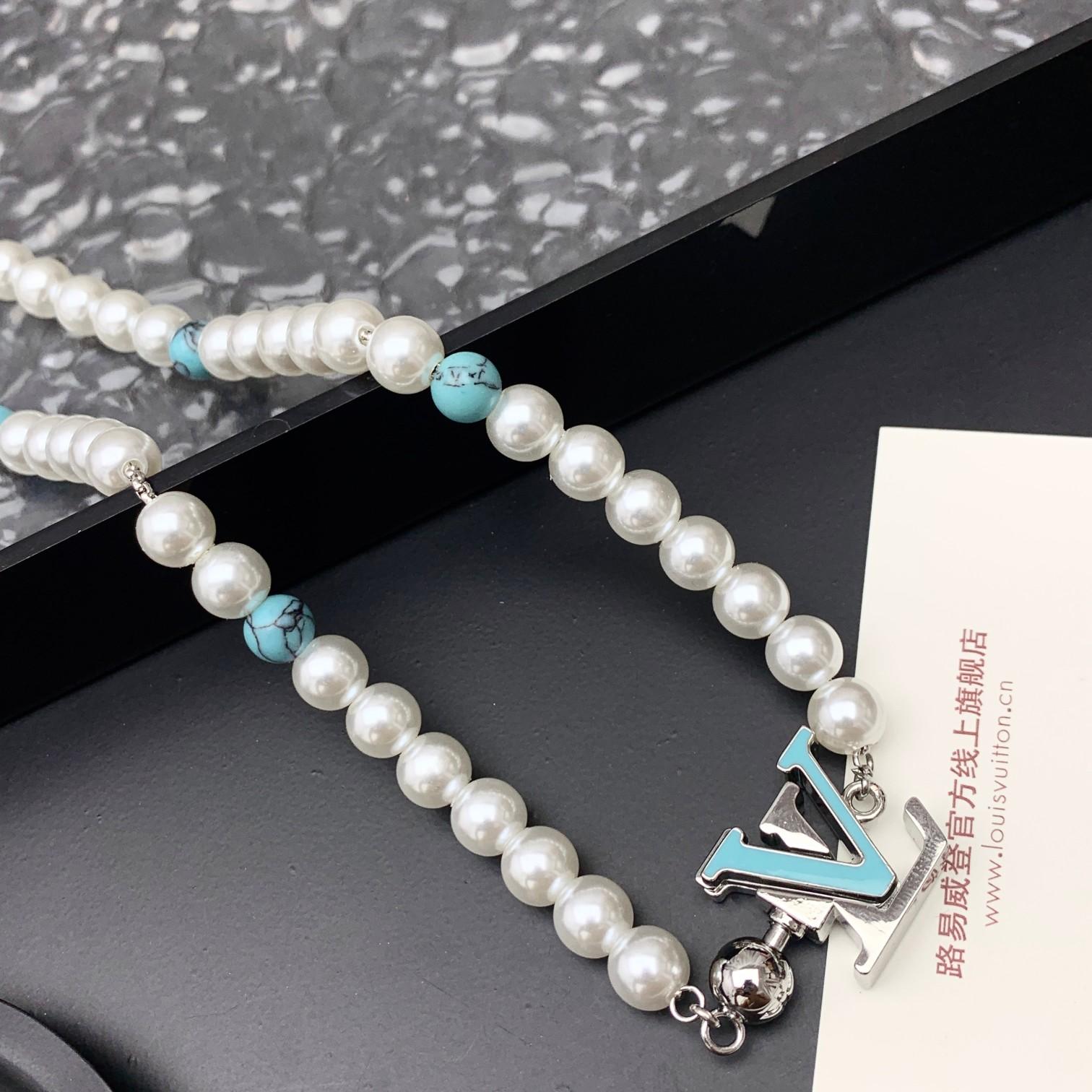 Louis Vuitton Turquoise Rodeo Necklace   M02058 - DopestKickz