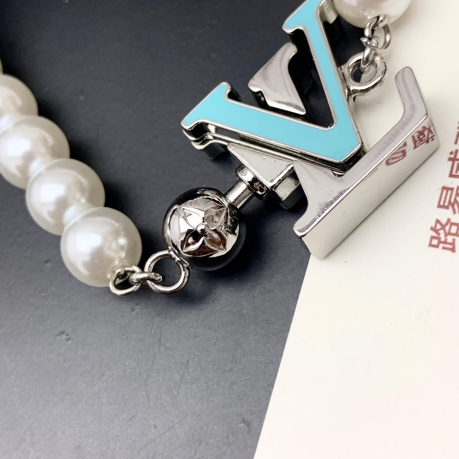 Louis Vuitton Turquoise Rodeo Necklace   M02058 - DopestKickz