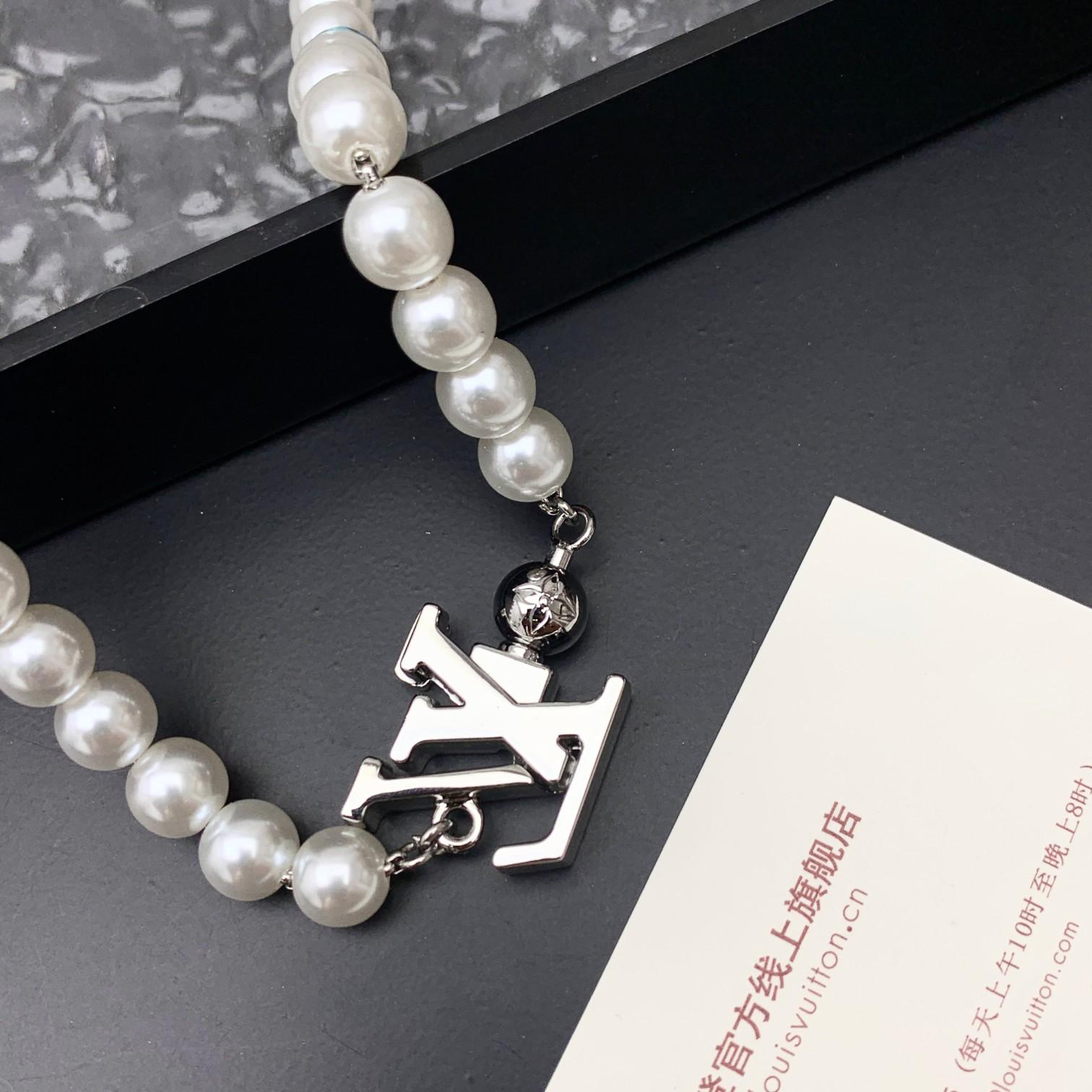 Louis Vuitton Turquoise Rodeo Necklace   M02058 - DopestKickz