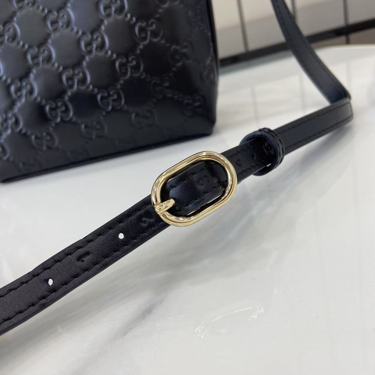 Gucci GG Emblem Nano Bucket Bag - DopestKickz