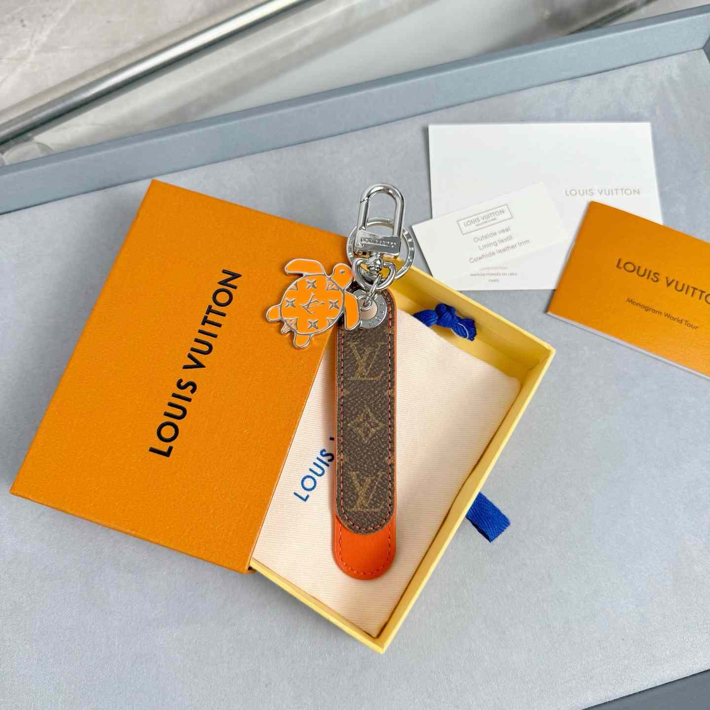 Louis Vuitton Dragonne Tab Key Holder and Bag Charm   M02558 - DopestKickz