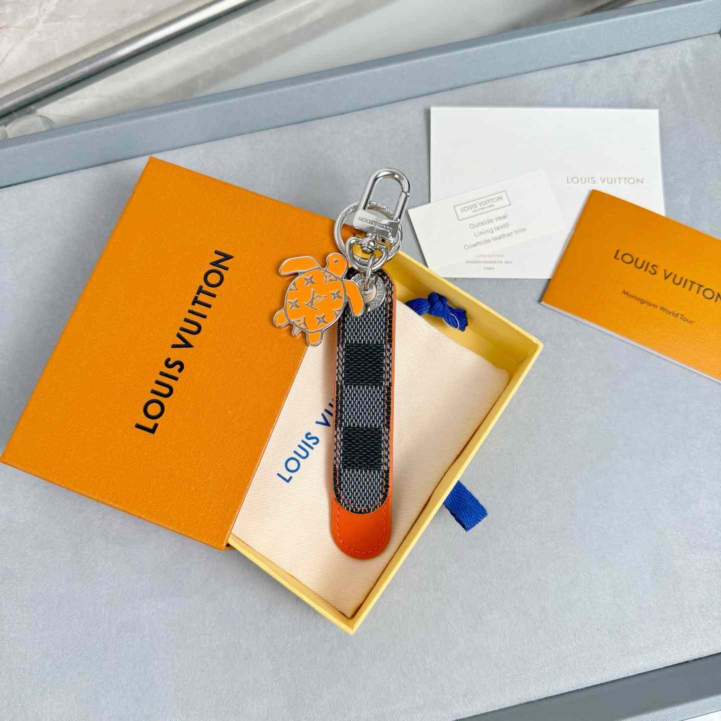 Louis Vuitton Dragonne Tab Key Holder and Bag Charm   M02558 - DopestKickz