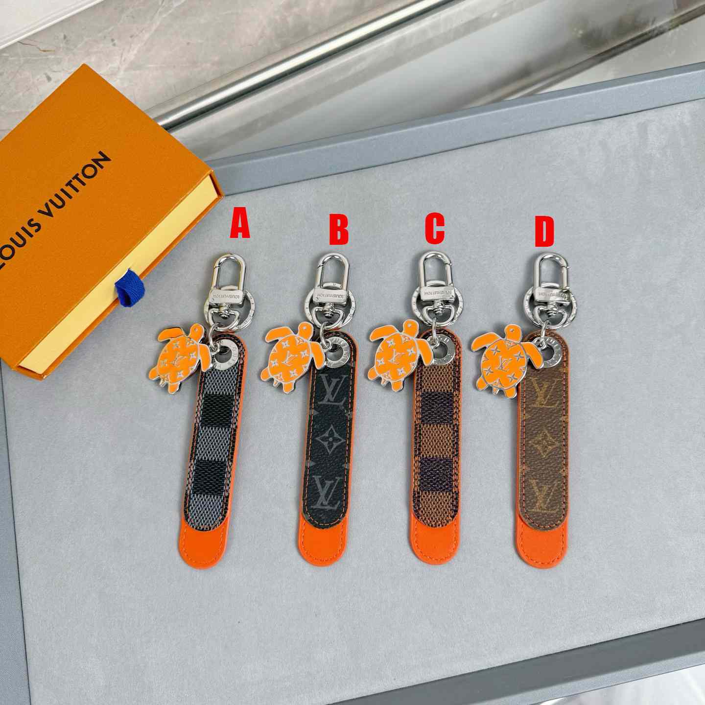 Louis Vuitton Dragonne Tab Key Holder and Bag Charm   M02558 - DopestKickz