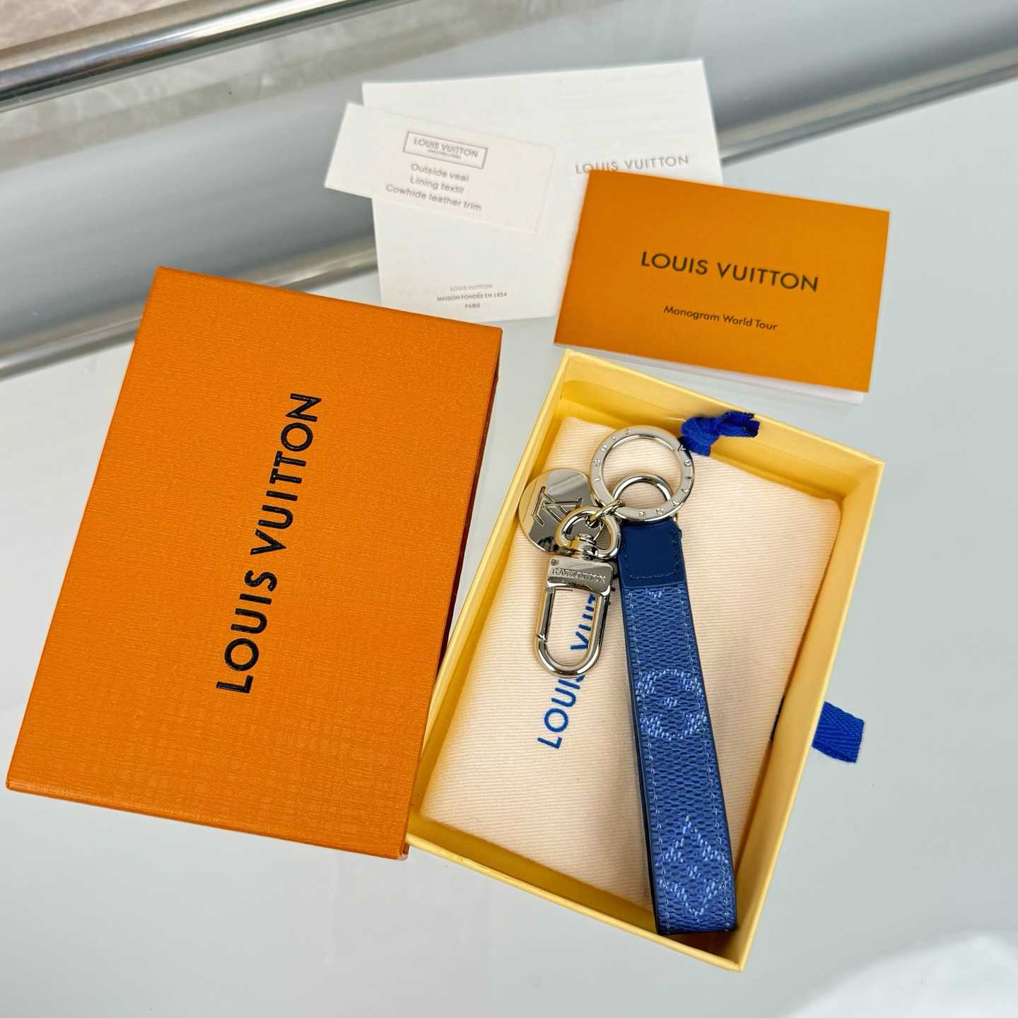 Louis Vuitton LV Slim Dragonne Key Holder and Bag Charm S00  - DopestKickz