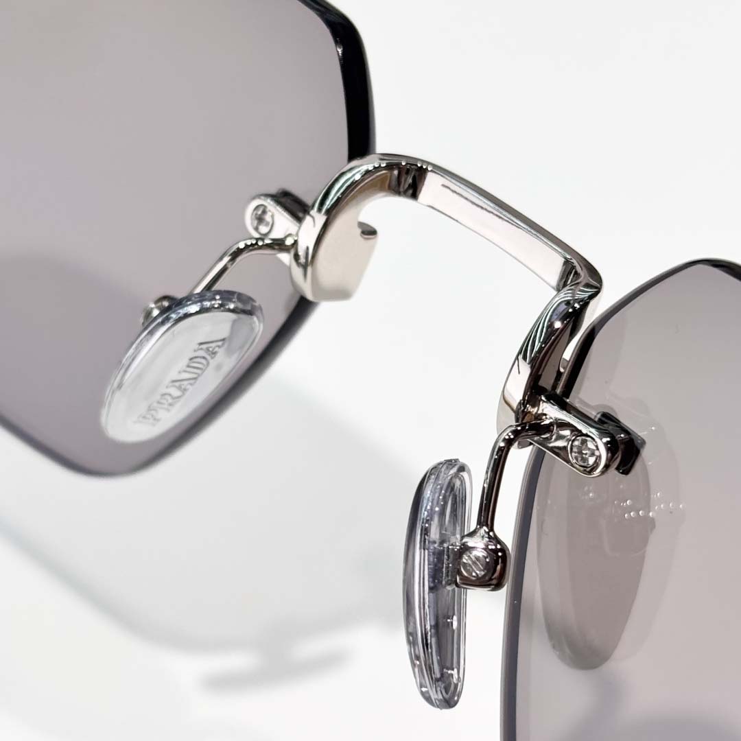 Prada SPR D55S Sunglasses     - DopestKickz