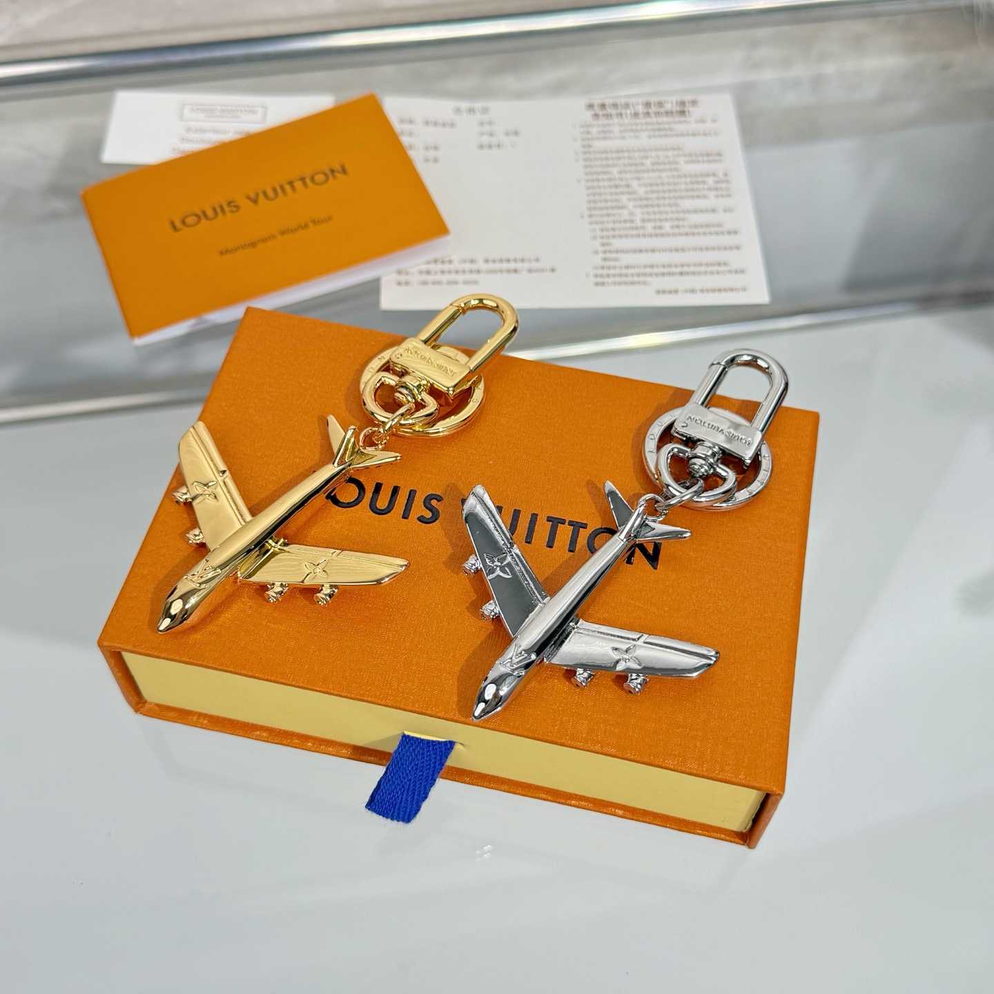 Louis Vuitton LV Plane Key Holder and Bag Charm S00 - DopestKickz