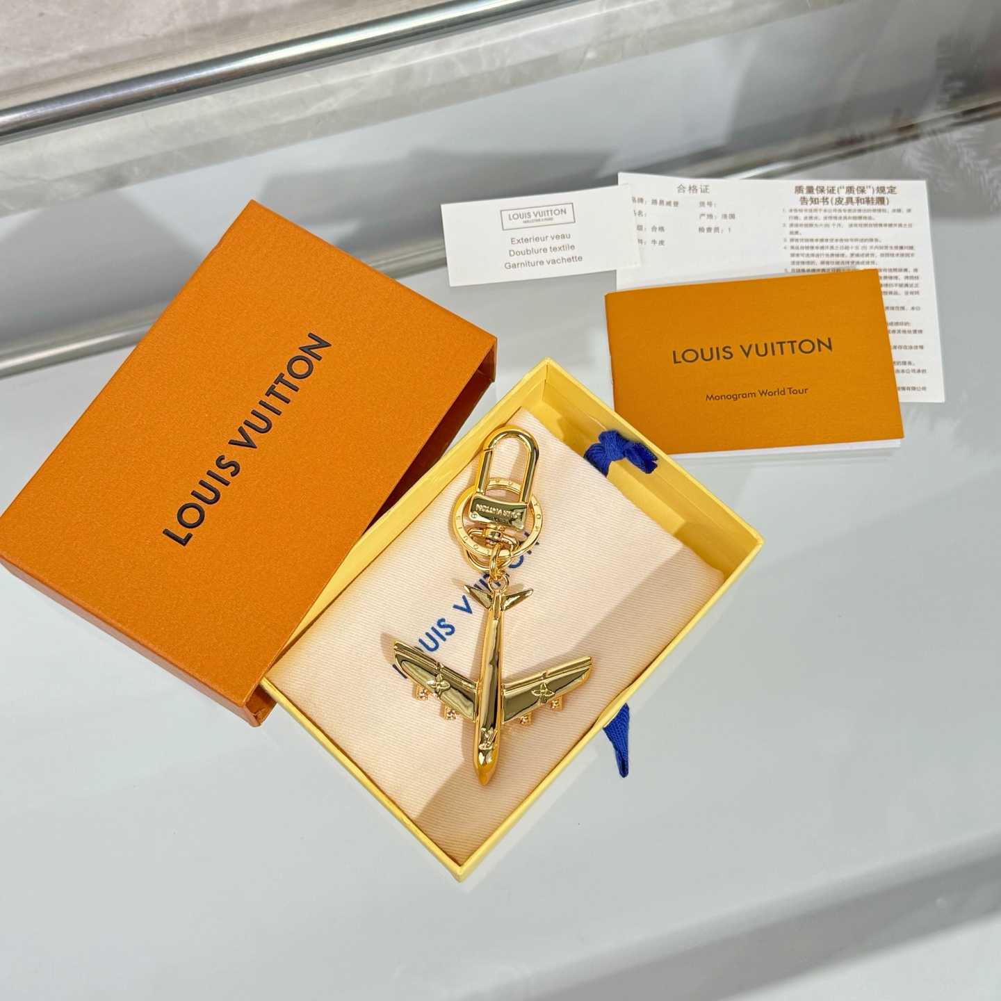 Louis Vuitton LV Plane Key Holder and Bag Charm S00 - DopestKickz