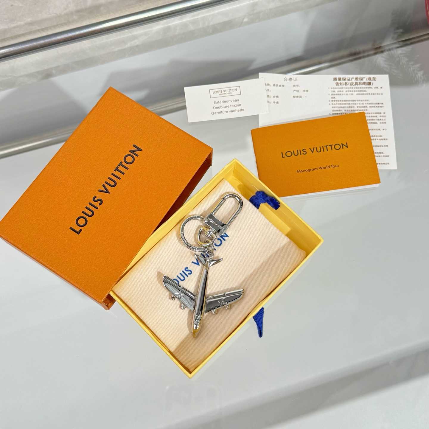 Louis Vuitton LV Plane Key Holder and Bag Charm S00 - DopestKickz