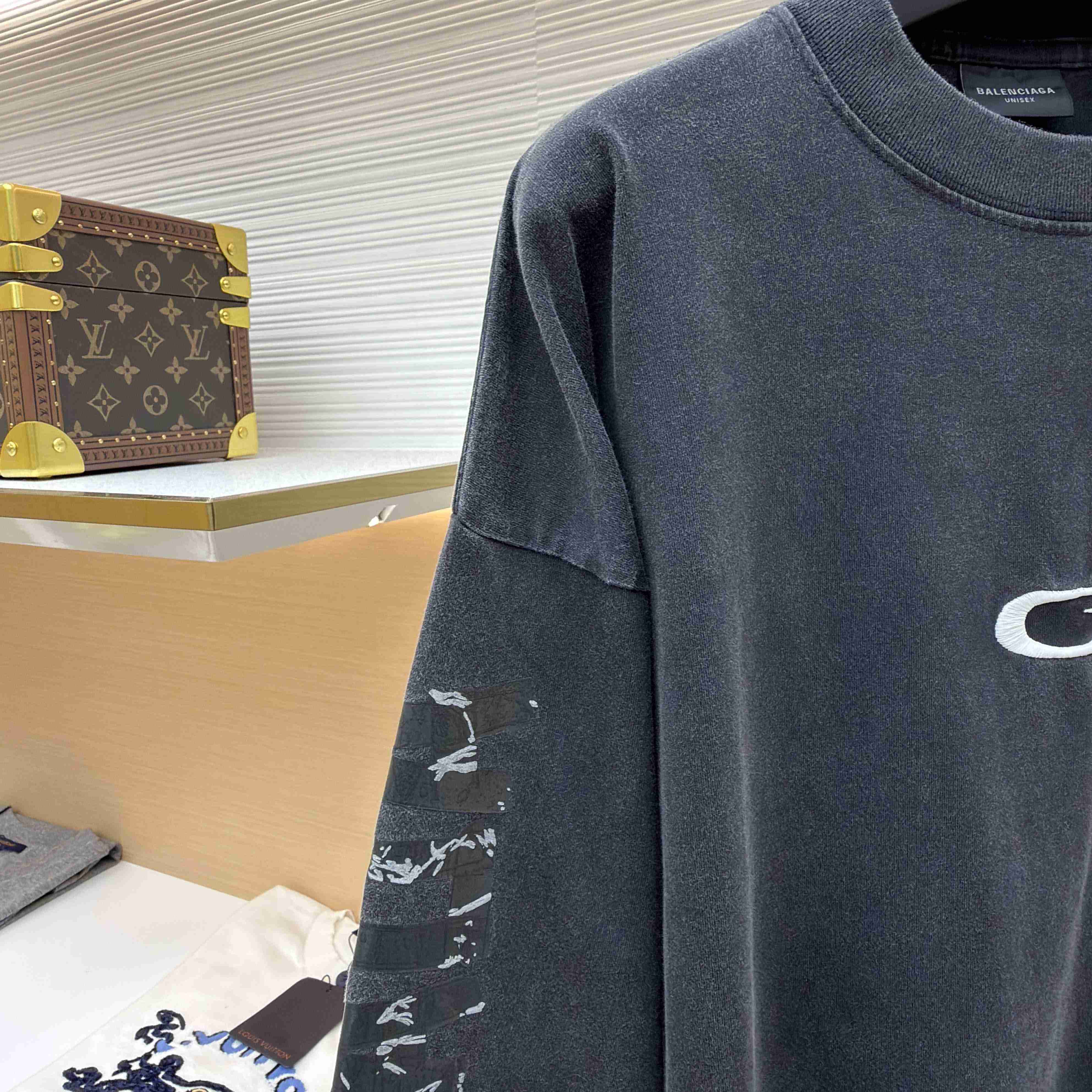 Balenciaga Men's Transparent Tape Shifted Oversized Long Sleeve T-shirt - DopestKickz