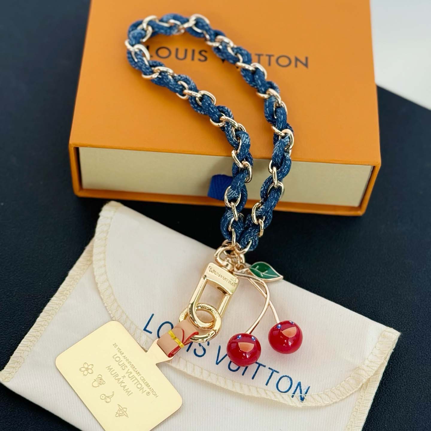 Louis Vuitton LV x TM Denim Cerise Phone Holder S00   M02623 - DopestKickz