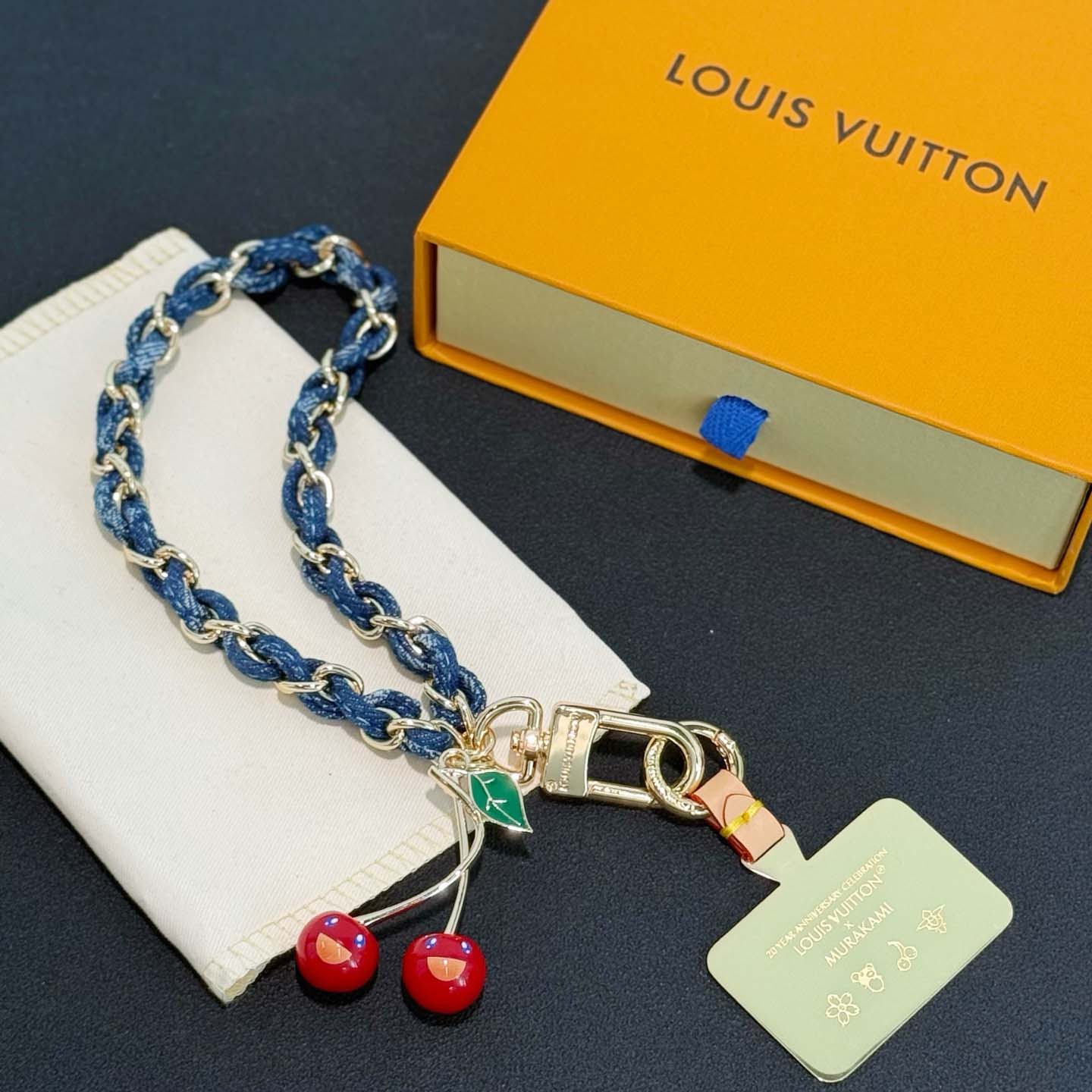 Louis Vuitton LV x TM Denim Cerise Phone Holder S00   M02623 - DopestKickz
