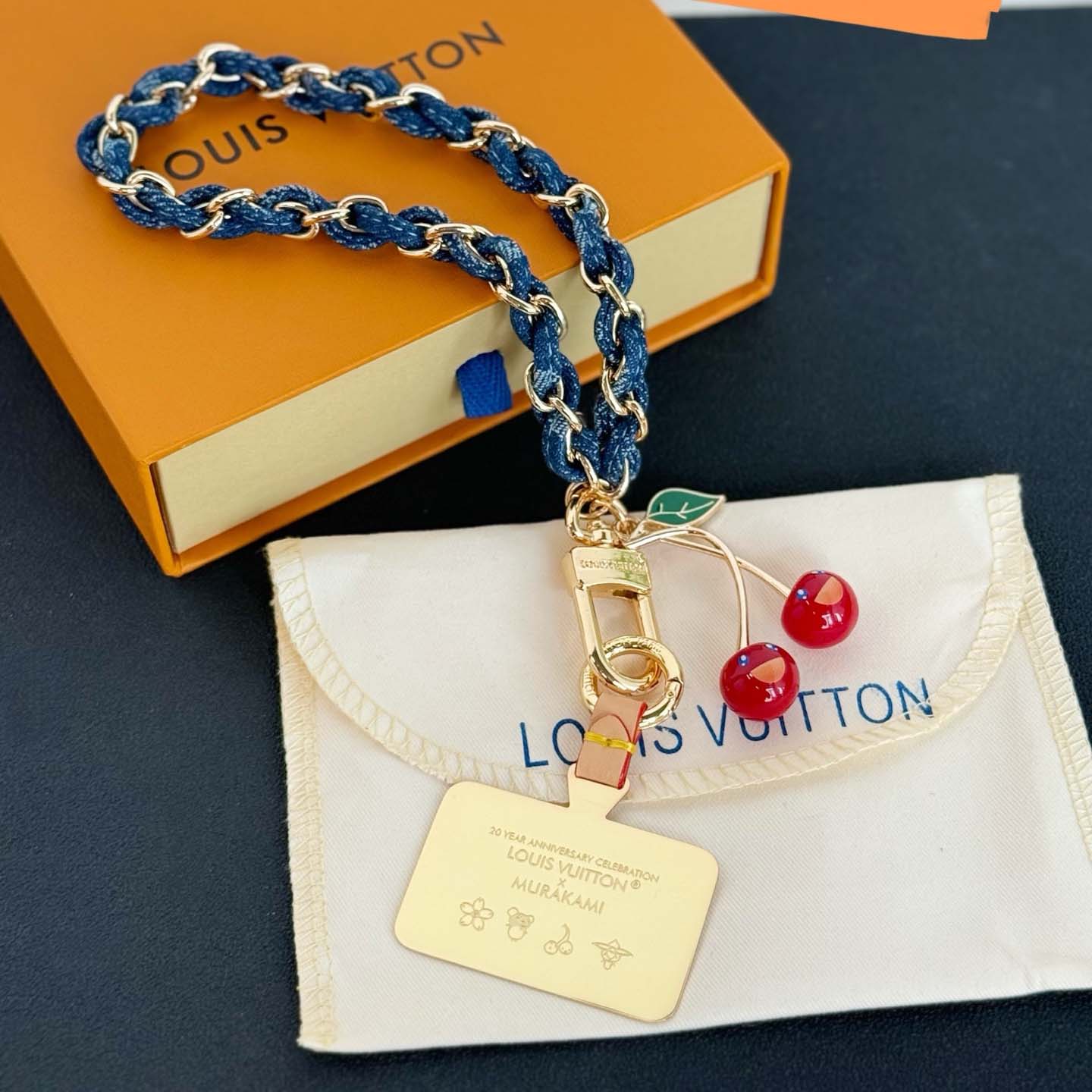 Louis Vuitton LV x TM Denim Cerise Phone Holder S00   M02623 - DopestKickz