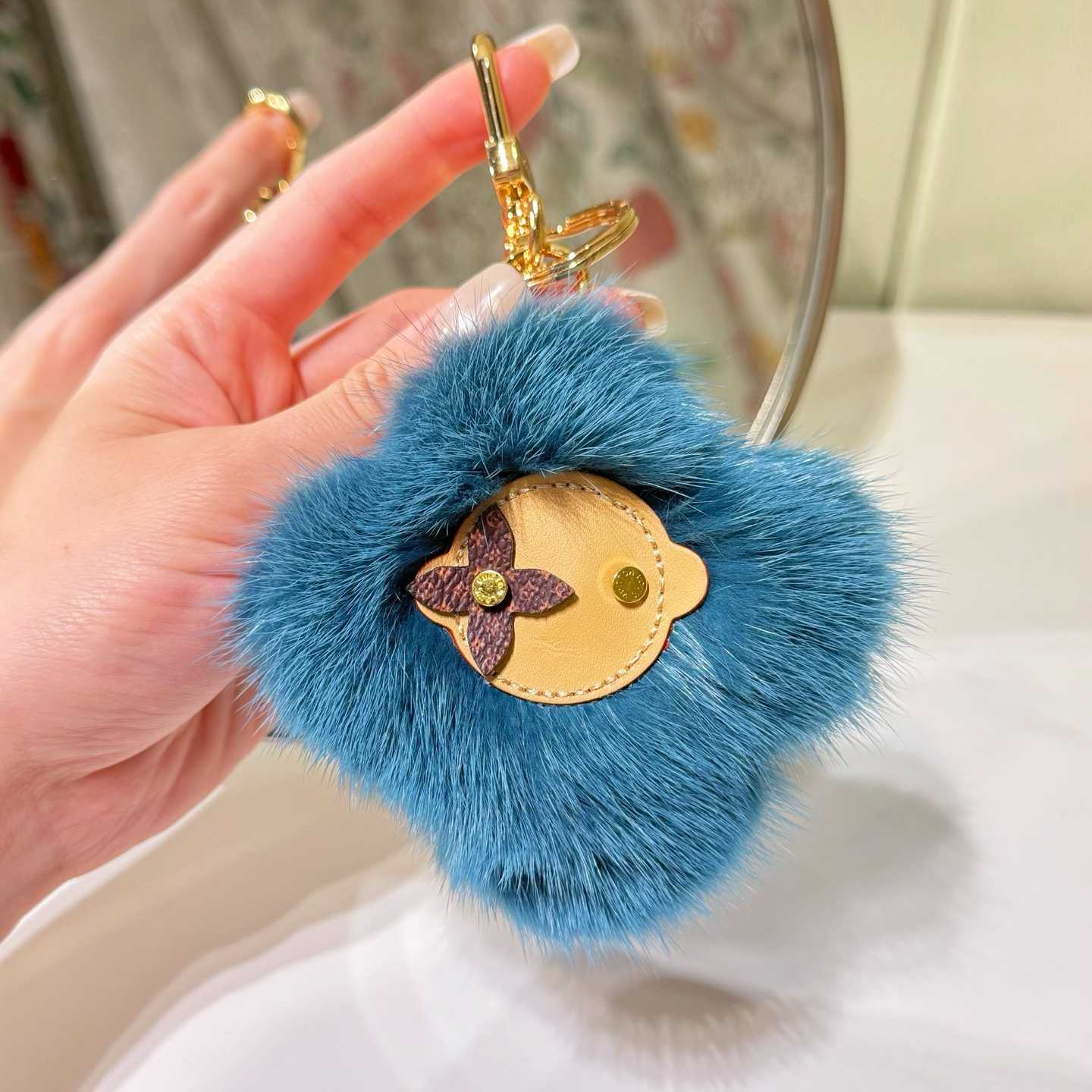 Louis Vuitton Vivienne Fur Key Holder   M03820 - DopestKickz