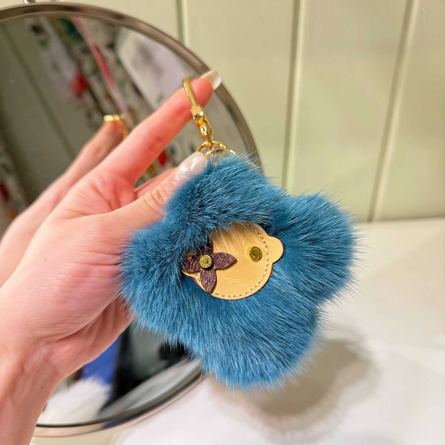 Louis Vuitton Vivienne Fur Key Holder   M03820 - DopestKickz