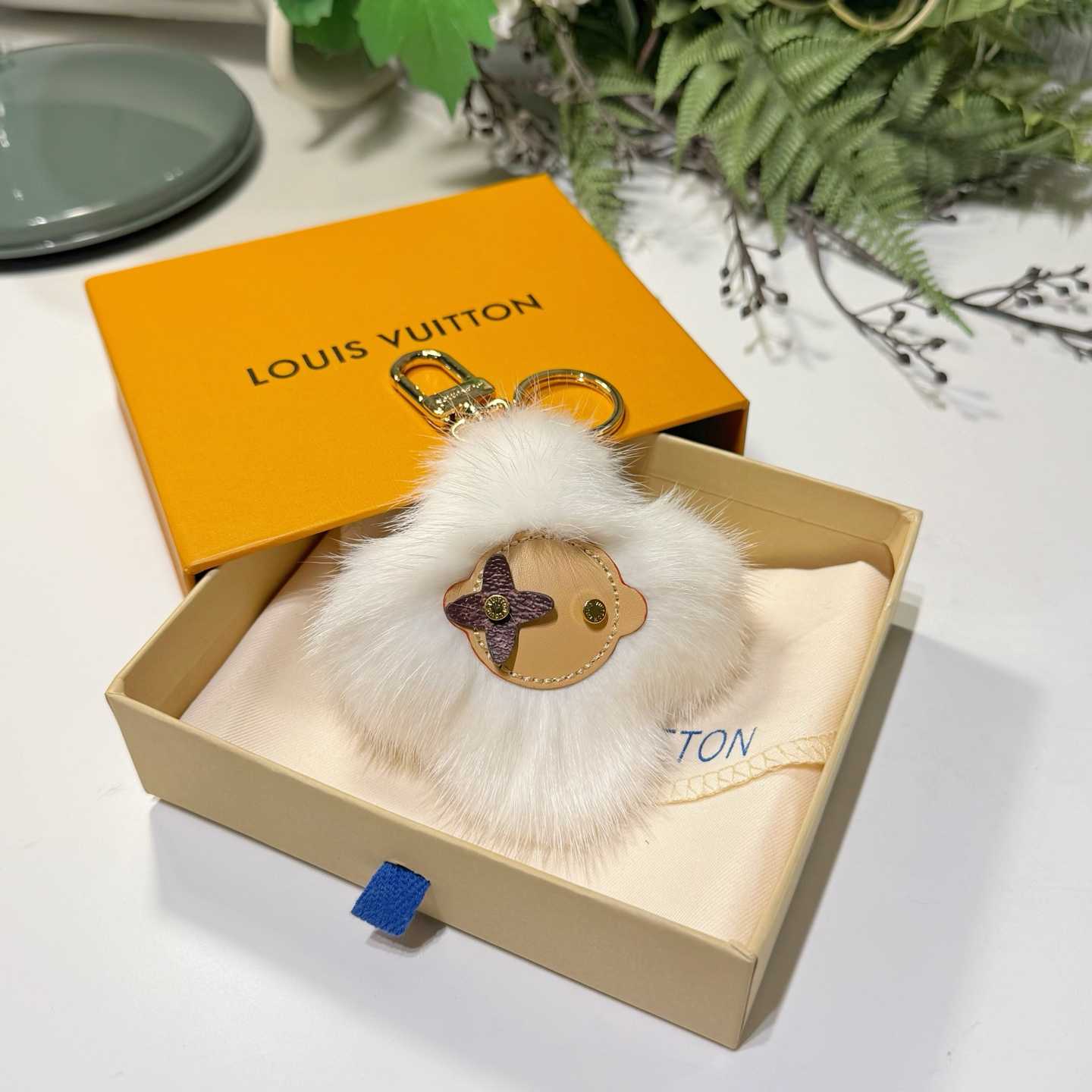 Louis Vuitton Vivienne Fur Key Holder   M02300 - DopestKickz