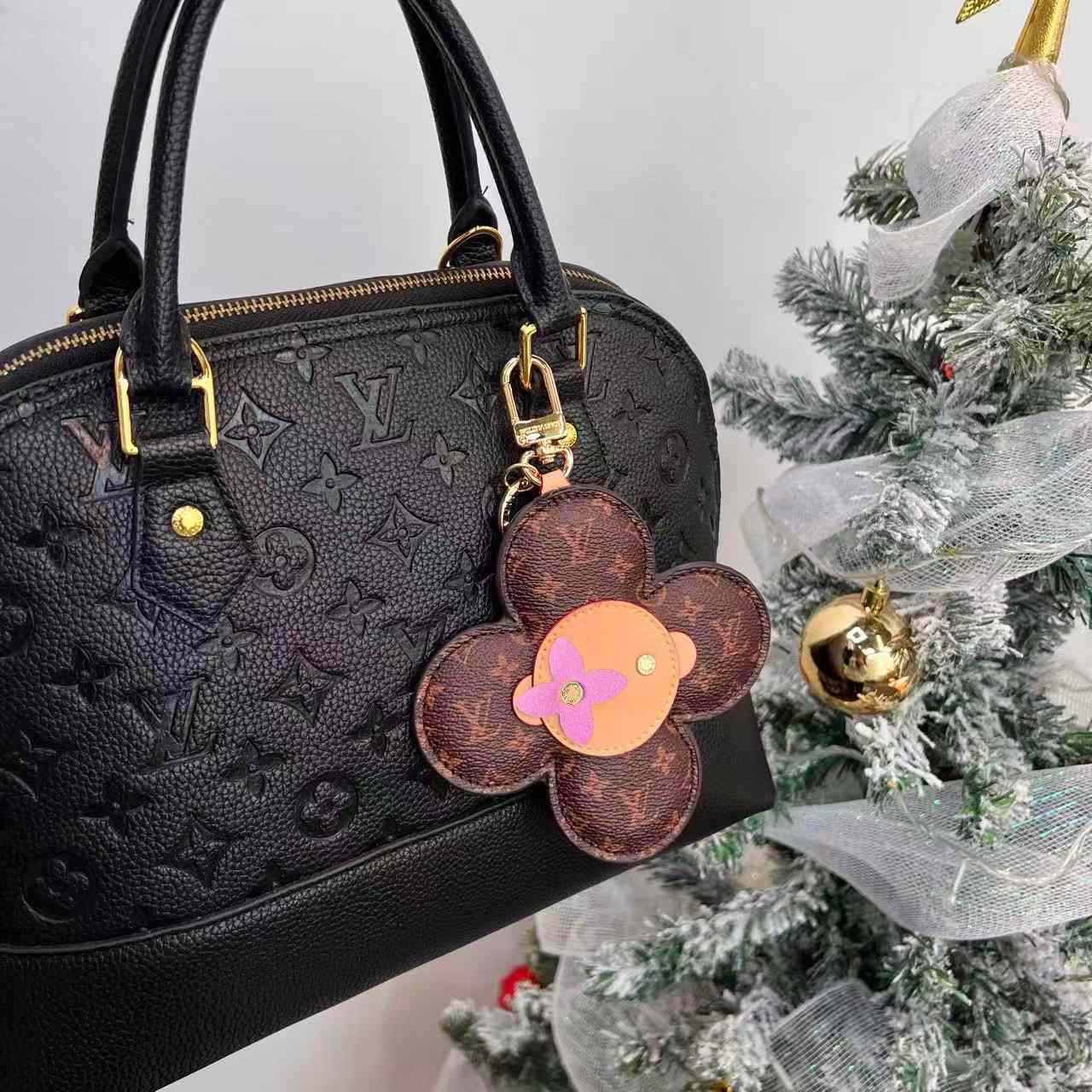 Louis Vuitton Vivienne Bag Charm   M03818 - DopestKickz