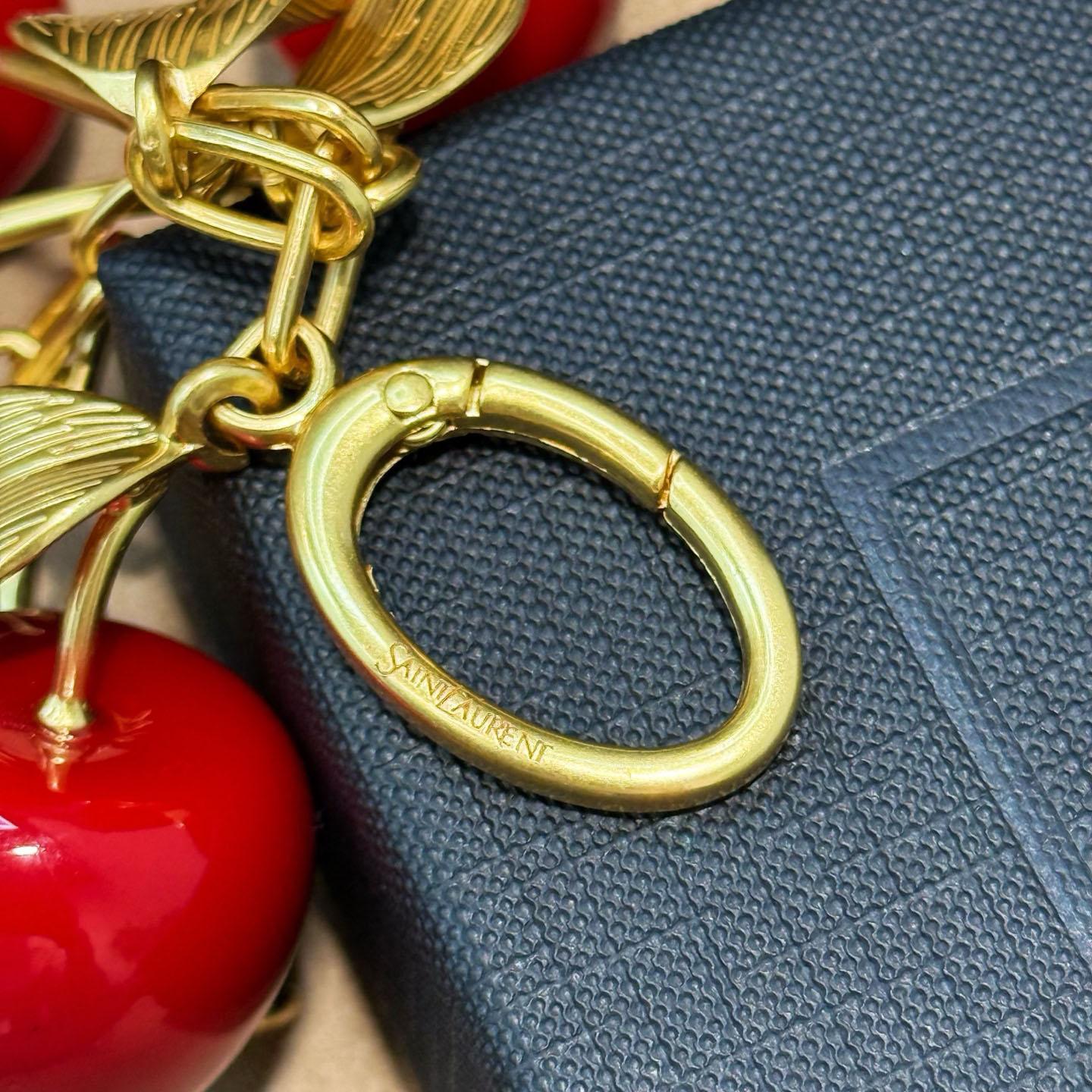 Saint Laurent CASSANDRE Cherry Bag Charm In Resin And Metal - DopestKickz