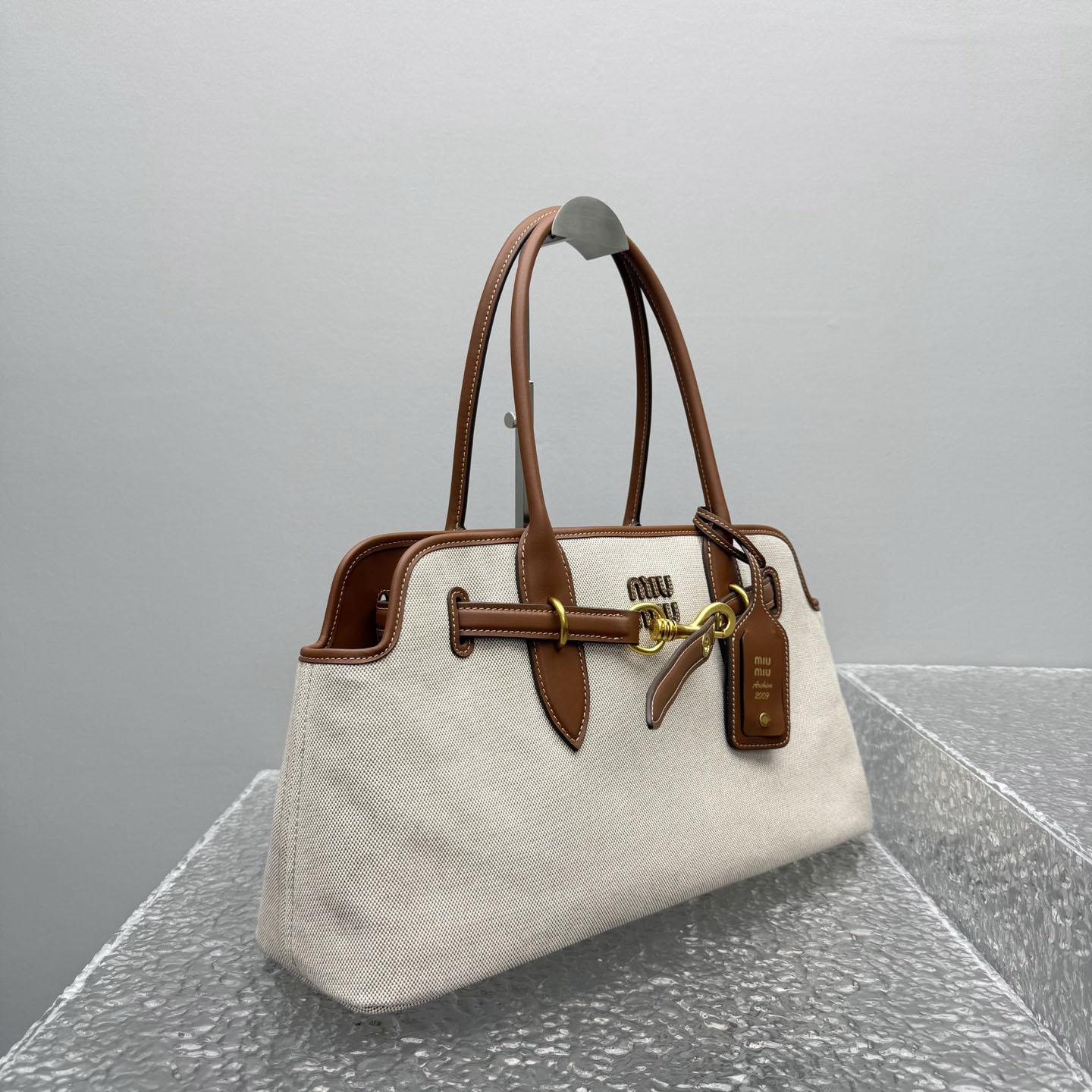 Miu Miu Aventure Canvas And Leather Bag - DopestKickz