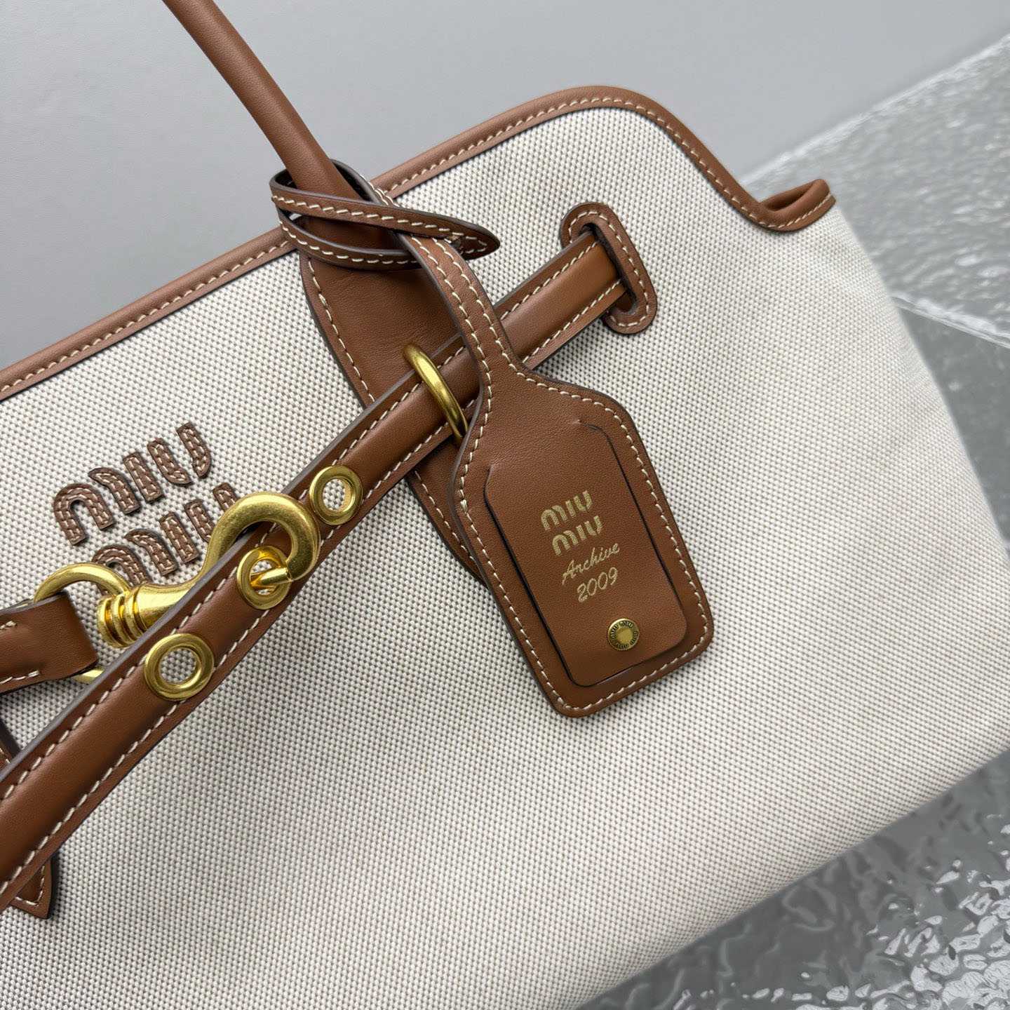 Miu Miu Aventure Canvas And Leather Bag - DopestKickz