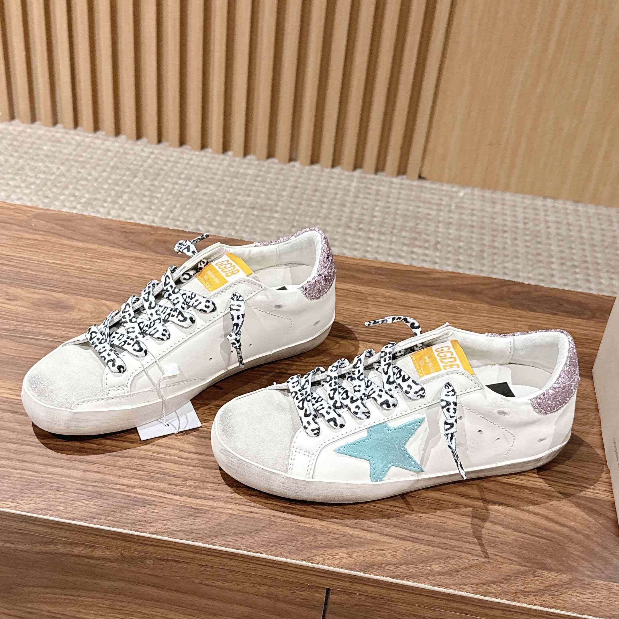 Golden Goose Leather Printed Sneakers - DopestKickz