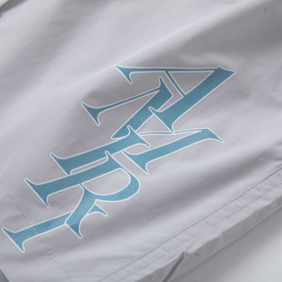 Amiri Stack Logo Swim Shorts In Stretch Limo - DopestKickz