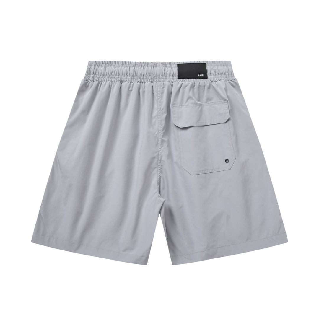 Amiri Stack Logo Swim Shorts In Stretch Limo - DopestKickz
