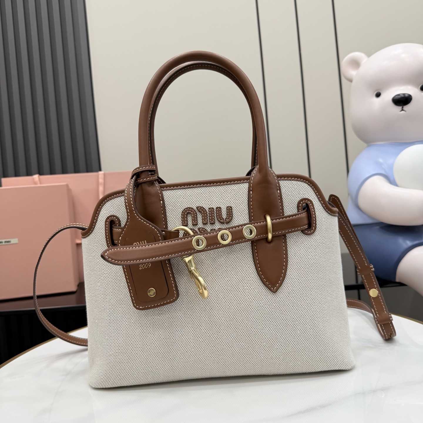 Miu Miu Aventure Canvas And Leather Bag - DopestKickz