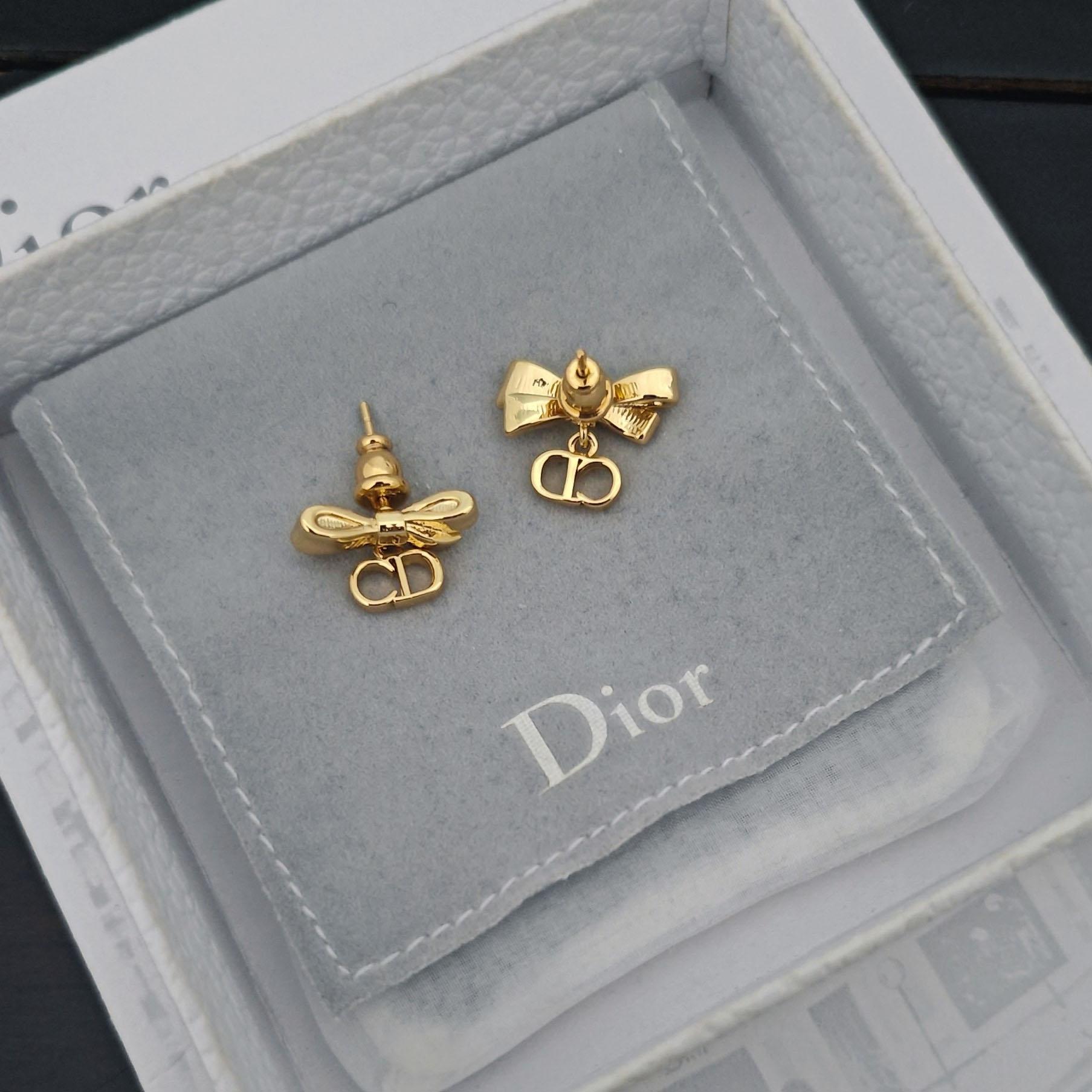 Dior CD Bow Earrings - DopestKickz