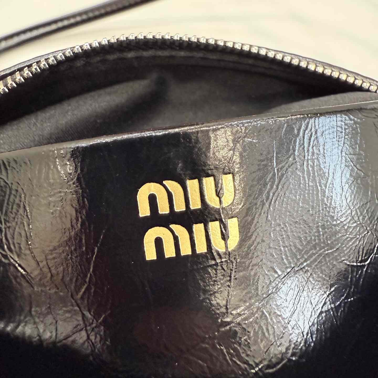 Miu Miu Shiny Leather Pouch - DopestKickz
